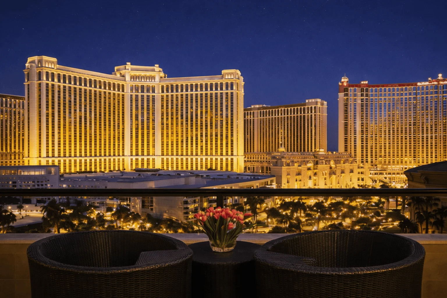 Bellagio Las Vegas hotel view from luxury balcony overlooking the city skyline at night
